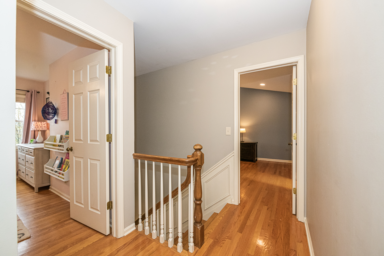 117 Whitney Drive Barrington, IL 60010 - Photo 21 of 37 a view of a hallway view with wooden floor and staircase