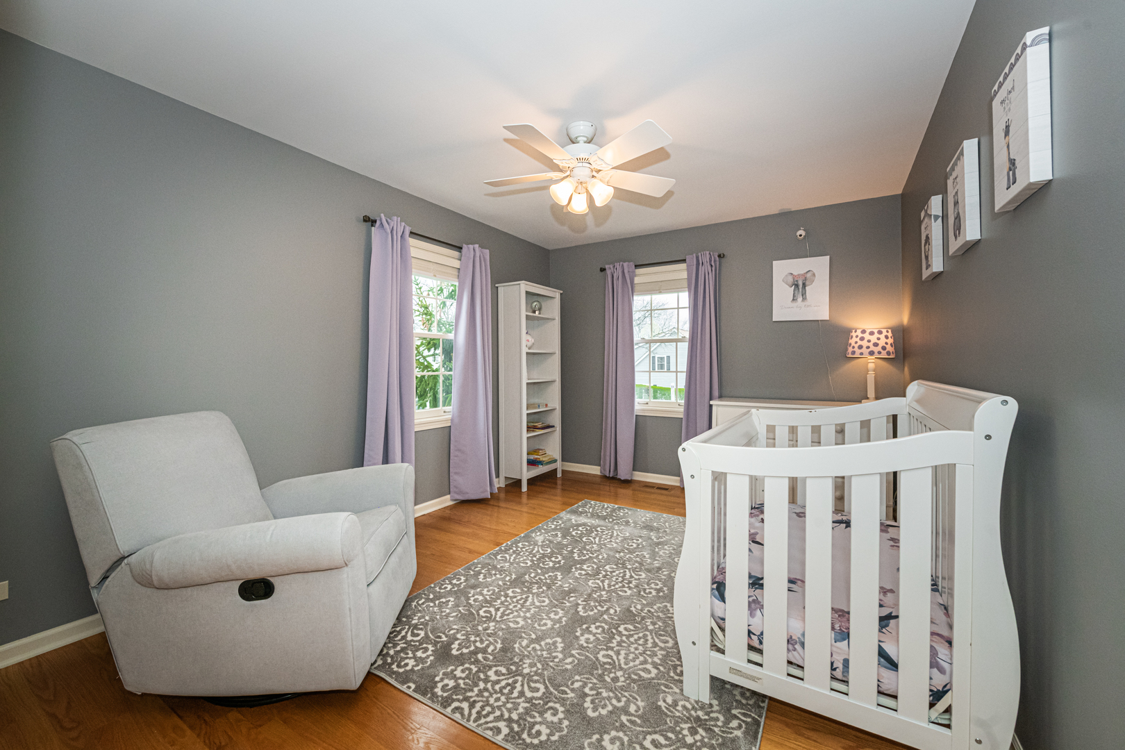 117 Whitney Drive Barrington, IL 60010 - Photo 27 of 37 a living room with furniture and a chandelier