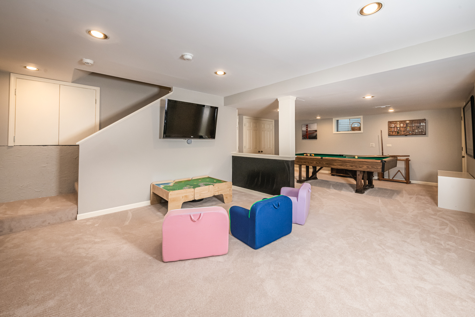 117 Whitney Drive Barrington, IL 60010 - Photo 30 of 37 a living room with furniture and a flat screen tv