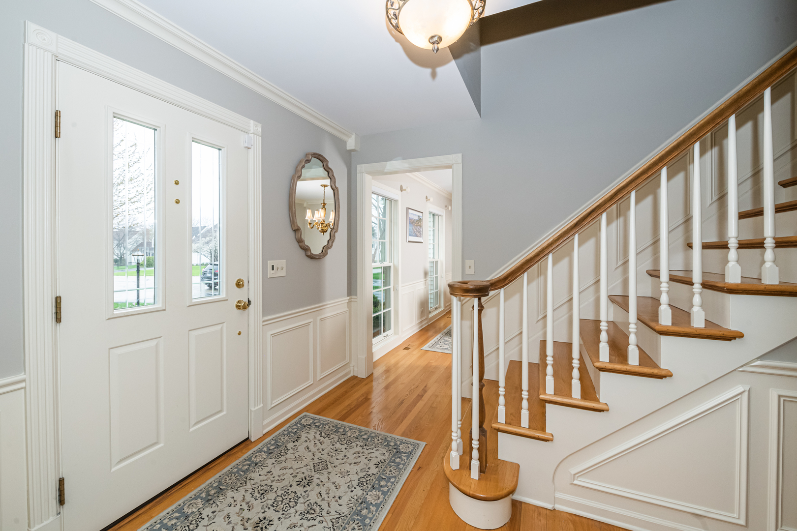 117 Whitney Drive Barrington, IL 60010 - Photo 3 of 37 a view of entryway with wooden floor and door