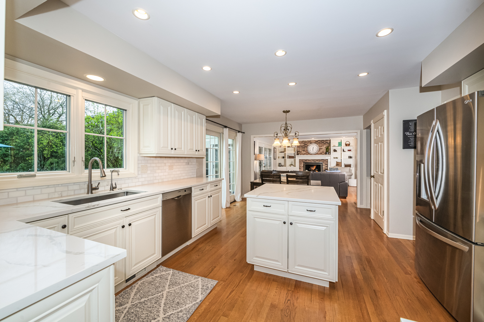 117 Whitney Drive Barrington, IL 60010 - Photo 8 of 37 a kitchen with a sink stainless steel appliances and window