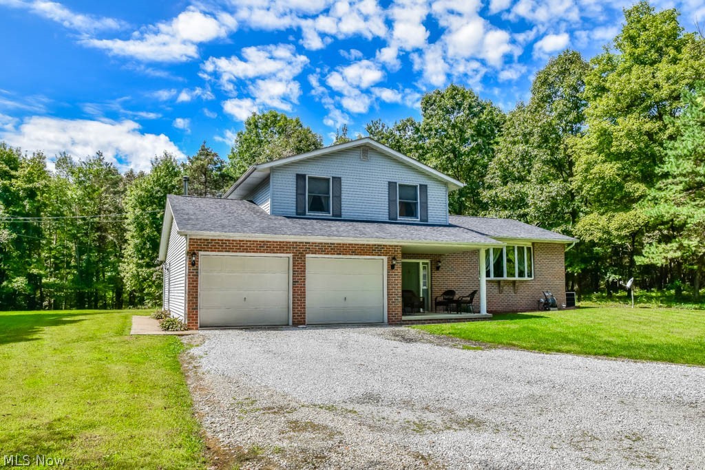 1175 Granada Road Northwest Dellroy, OH 44620 - Photo 1 of 28 Wonderful country setting at this 3 bedroom, 2.5 bath 4-level split on nearly 3 acres!