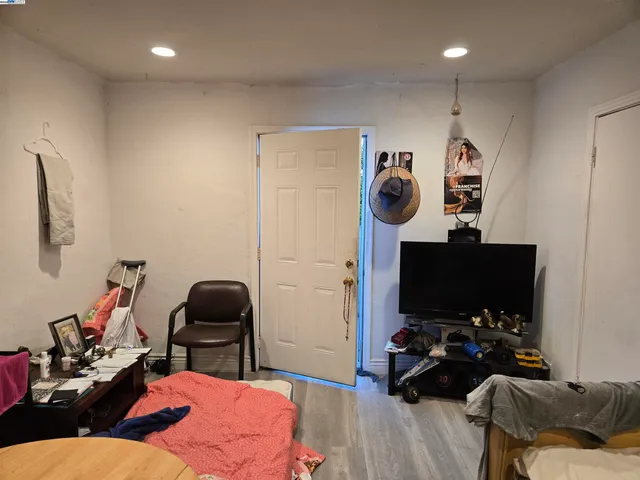 a room with a couch and a flat screen tv