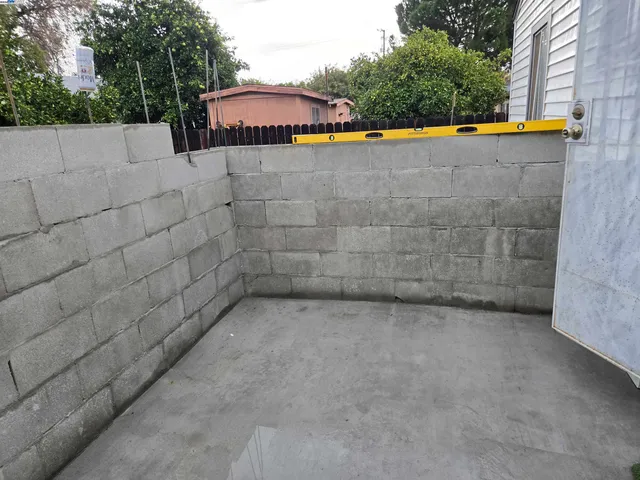 a backyard of a house and outdoor seating