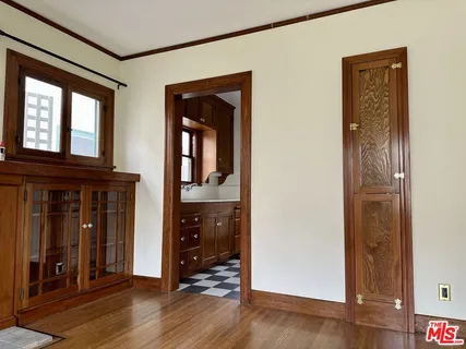 wooden floor and window in a room