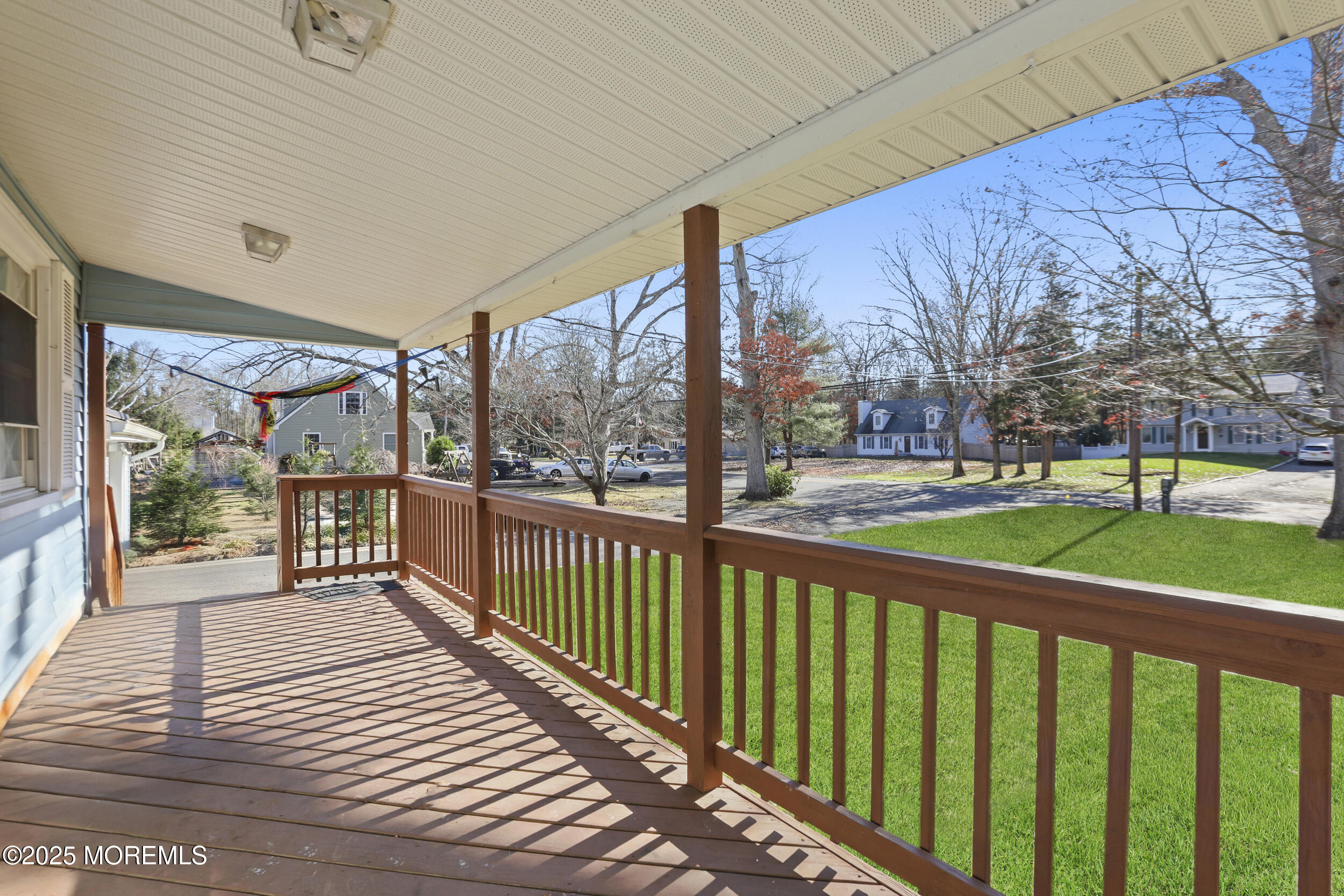 58 East Pleasant Grove Road Jackson, NJ 08527 - Photo 6 of 8 a view of a deck with a big yard