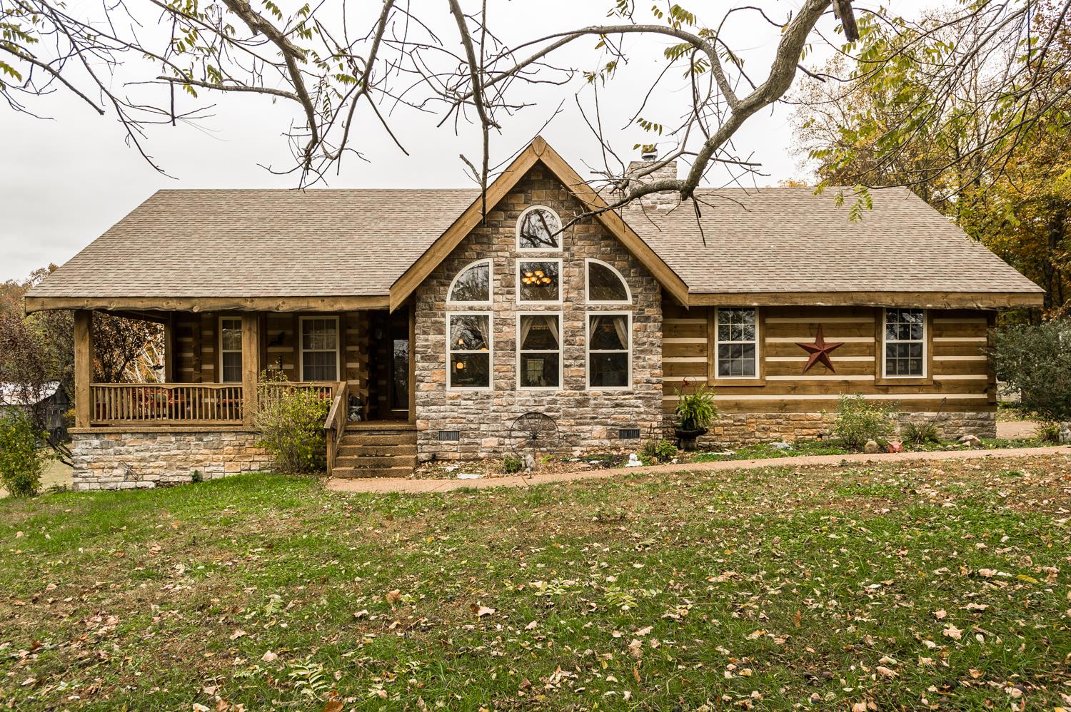 6161 Red River School Road Portland, TN 37148 - Photo 1 of 29 a front view of a house with a yard