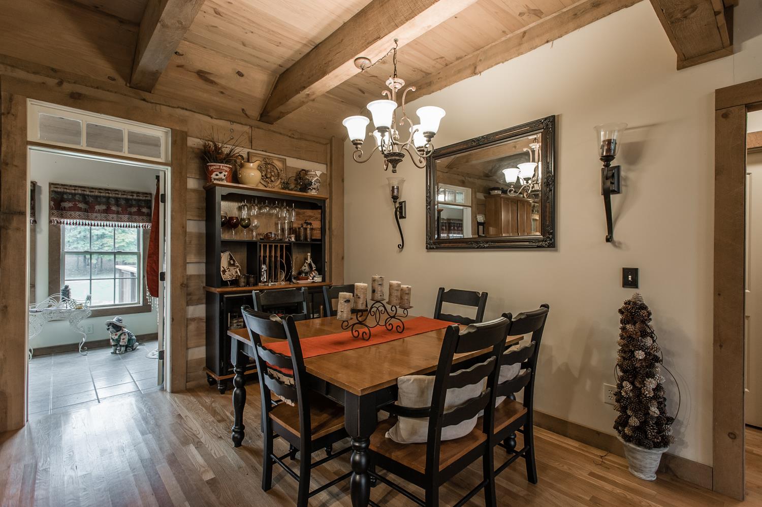 6161 Red River School Road Portland, TN 37148 - Photo 18 of 29 a view of a dining room with furniture and wooden floor