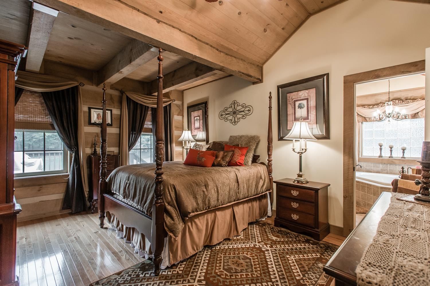 6161 Red River School Road Portland, TN 37148 - Photo 20 of 29 a bedroom with a bed next to a window with outer view