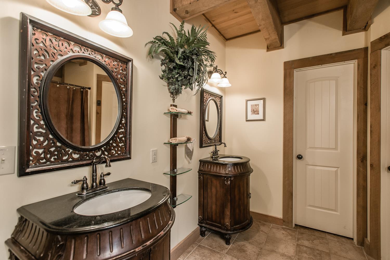 6161 Red River School Road Portland, TN 37148 - Photo 22 of 29 a bathroom with a sink a mirror and a toilet