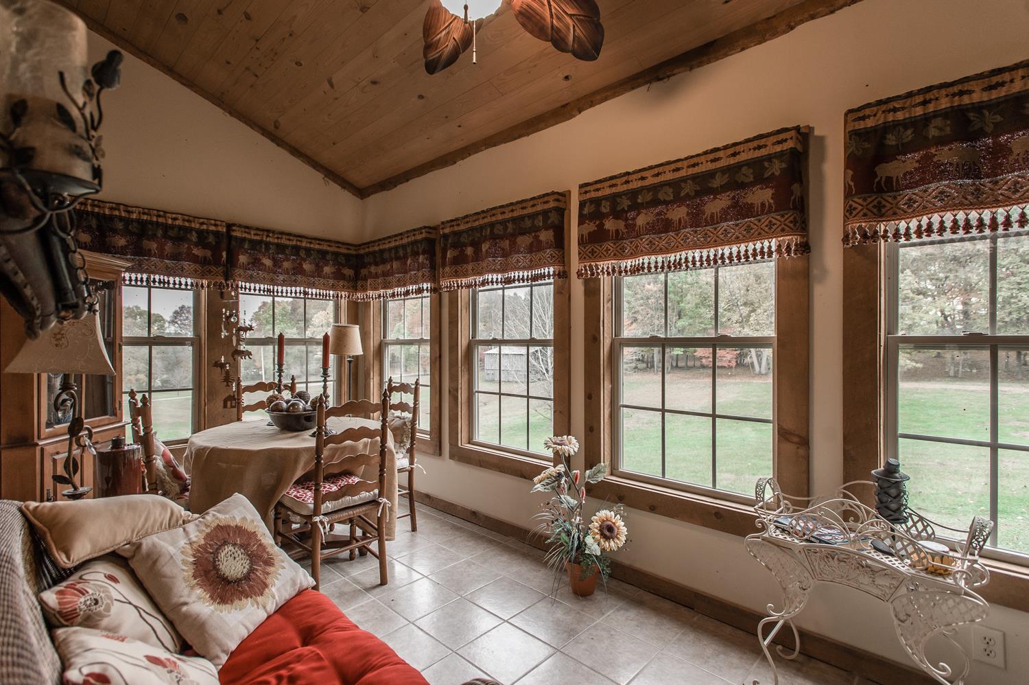 6161 Red River School Road Portland, TN 37148 - Photo 23 of 29 a room with furniture and floor to ceiling window
