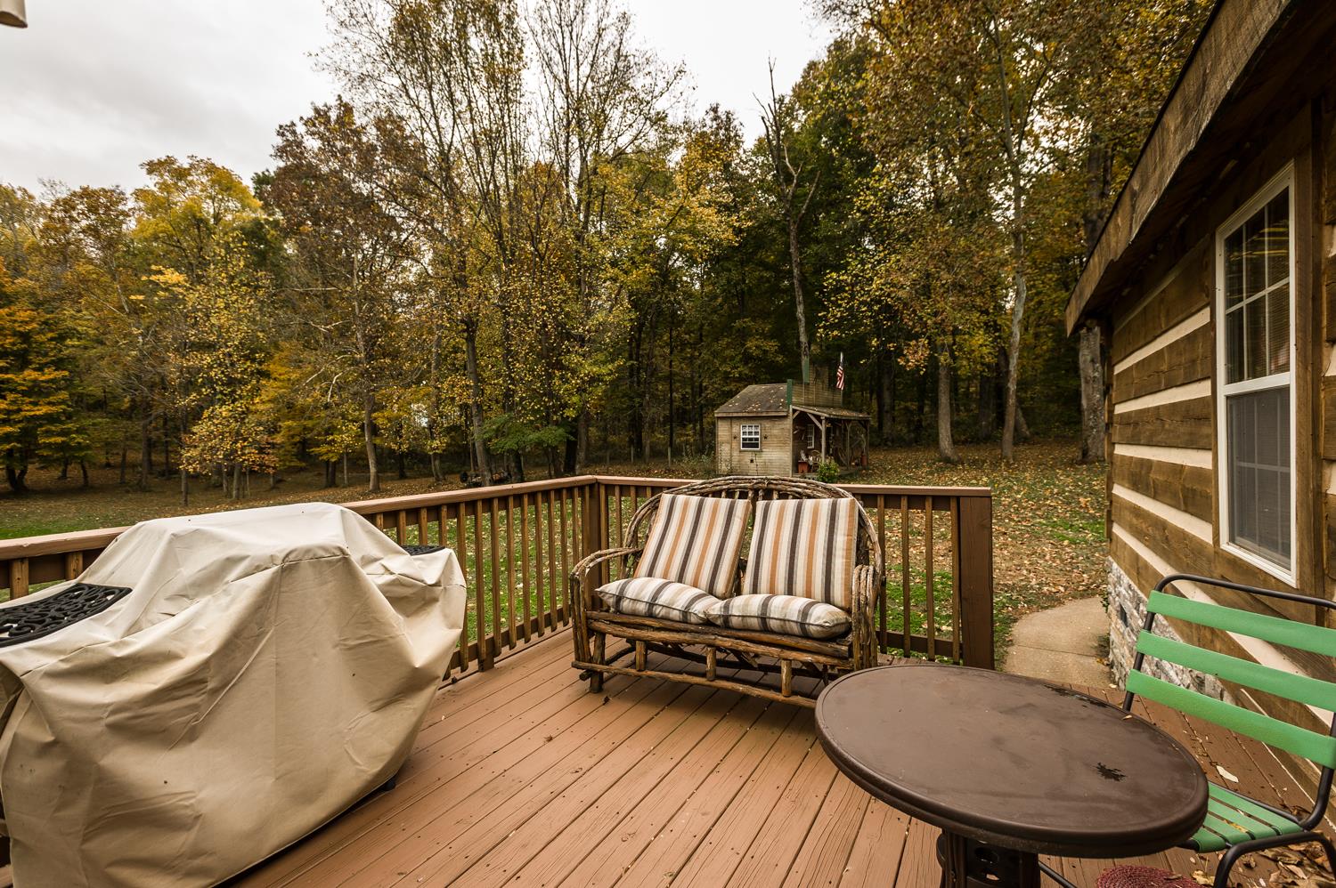 6161 Red River School Road Portland, TN 37148 - Photo 24 of 29 a view of balcony with wooden floor and outdoor seating