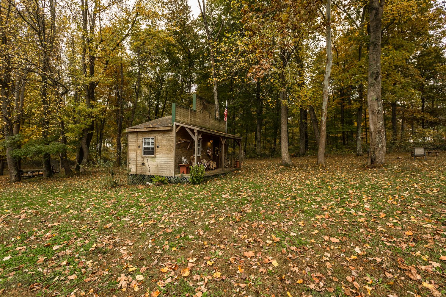 6161 Red River School Road Portland, TN 37148 - Photo 25 of 29 a backyard of a house with lots of green space