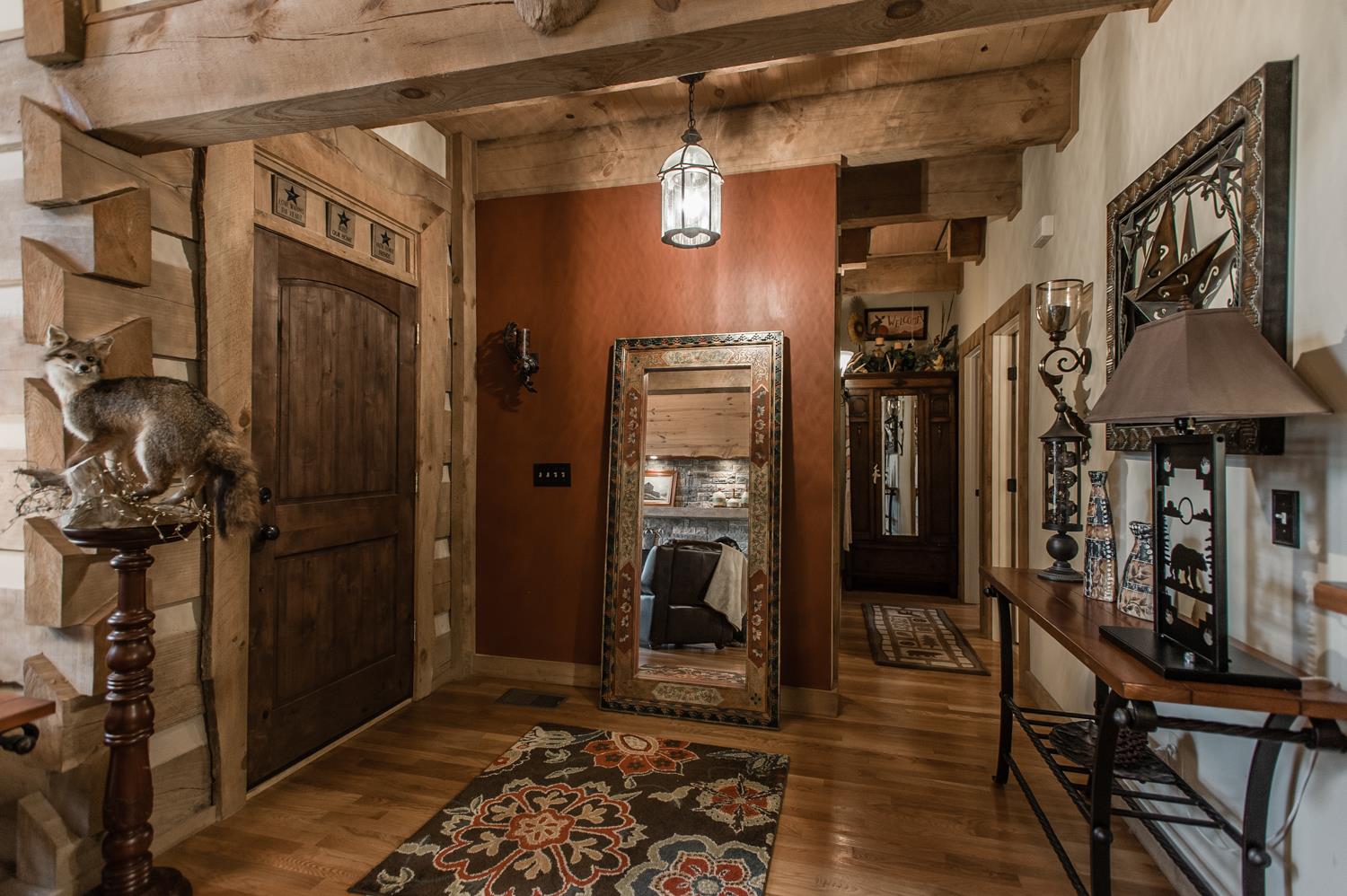 6161 Red River School Road Portland, TN 37148 - Photo 7 of 29 a view of a hallway with wooden floor and a bathroom