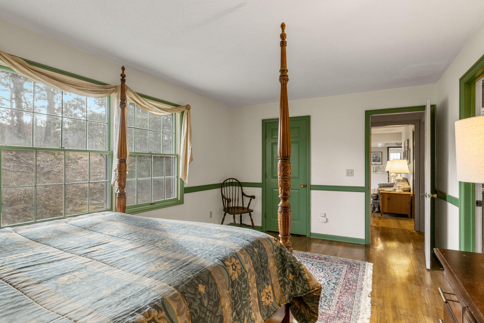 46 Chippingstone Road Chatham, MA 02633 - Photo 16 of 35 a bedroom with a bed and large window