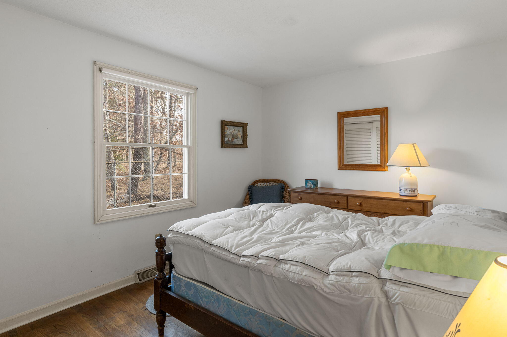 46 Chippingstone Road Chatham, MA 02633 - Photo 20 of 35 a bedroom with a bed and a window