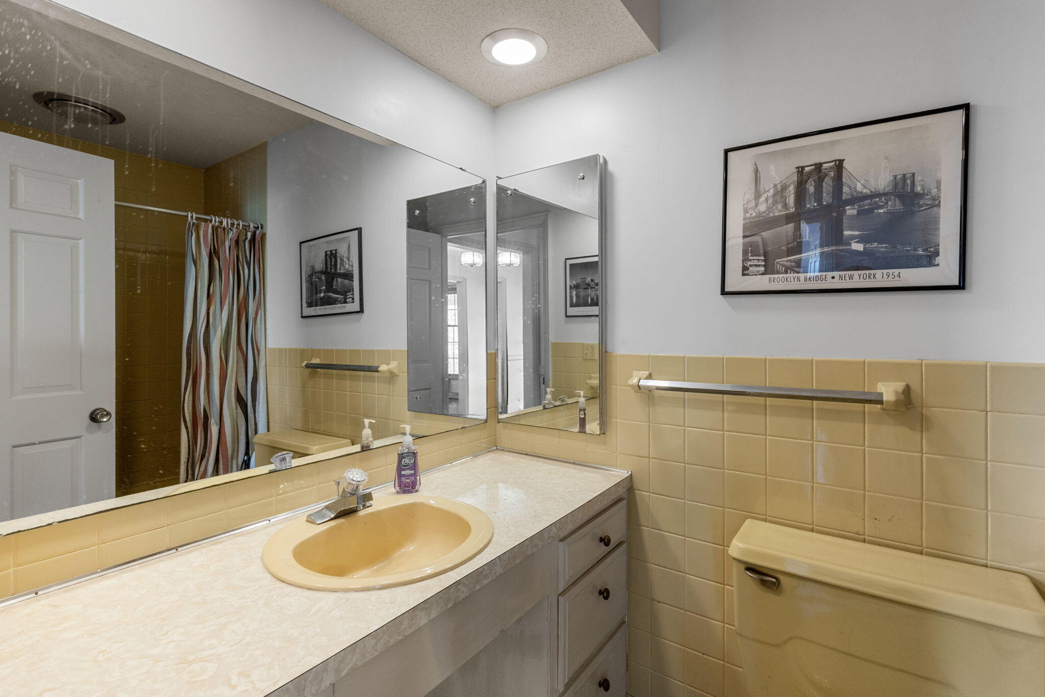 46 Chippingstone Road Chatham, MA 02633 - Photo 22 of 35 a bathroom with a granite countertop sink mirror and a shower