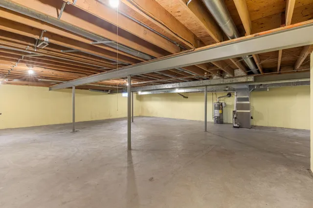 a view of a yard with large trees