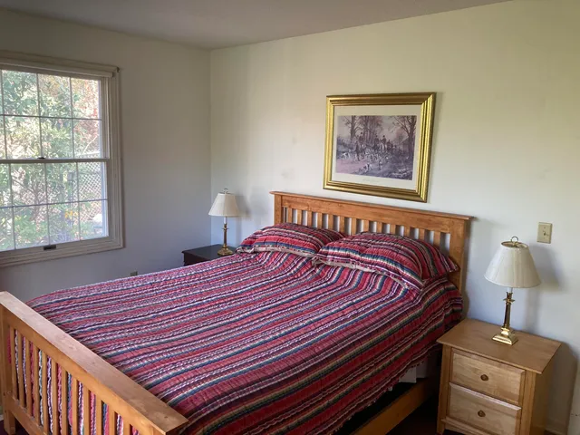 a view of room with window and cabinet