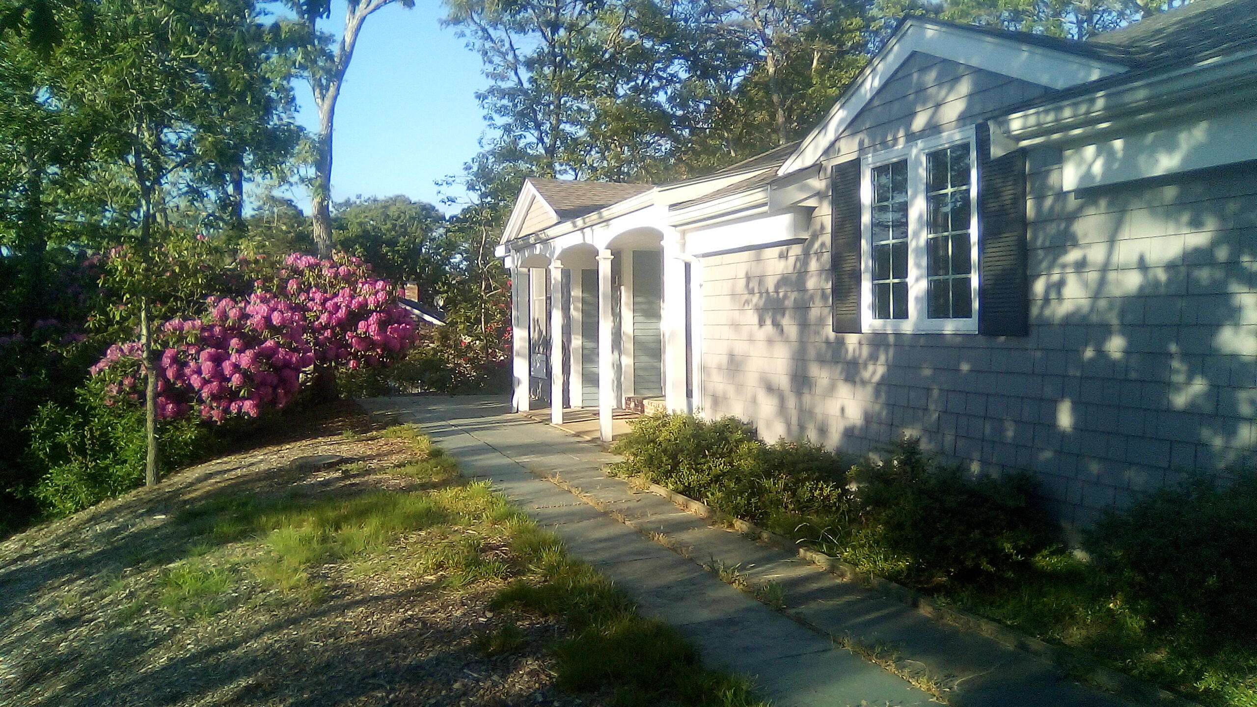 46 Chippingstone Road Chatham, MA 02633 - Photo 28 of 35 a view of a house with a yard and garden