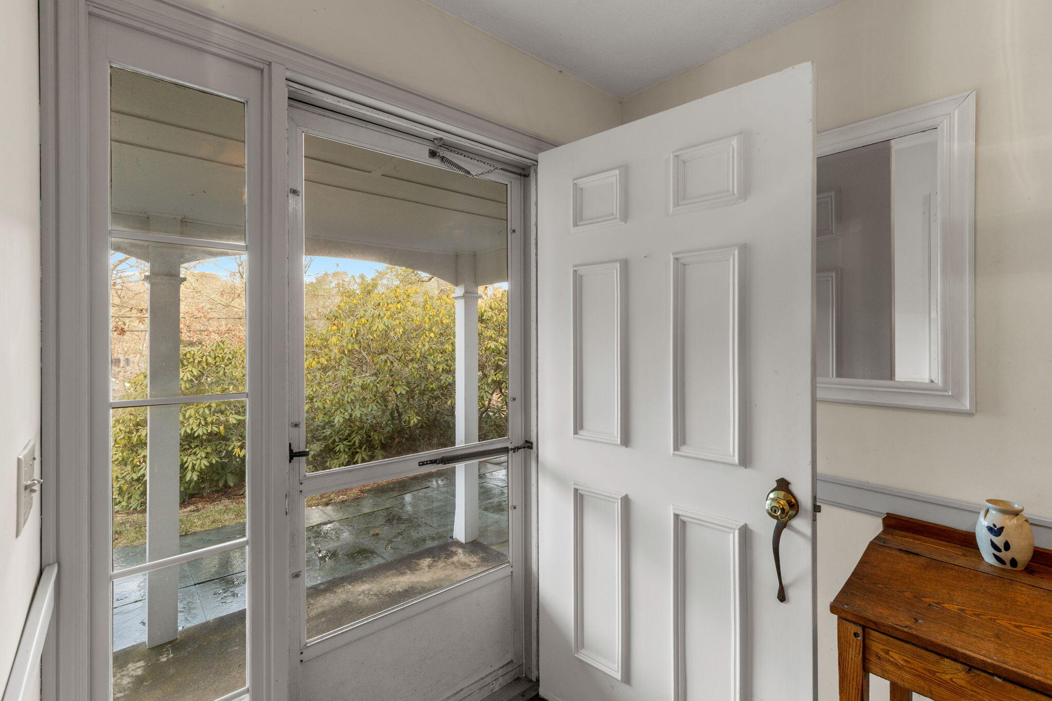 46 Chippingstone Road Chatham, MA 02633 - Photo 4 of 35 a view of a door and a window