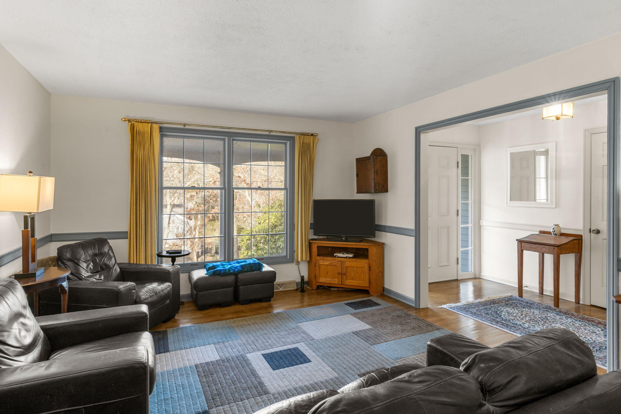 46 Chippingstone Road Chatham, MA 02633 - Photo 5 of 35 a bedroom with furniture a bed and a flat screen tv