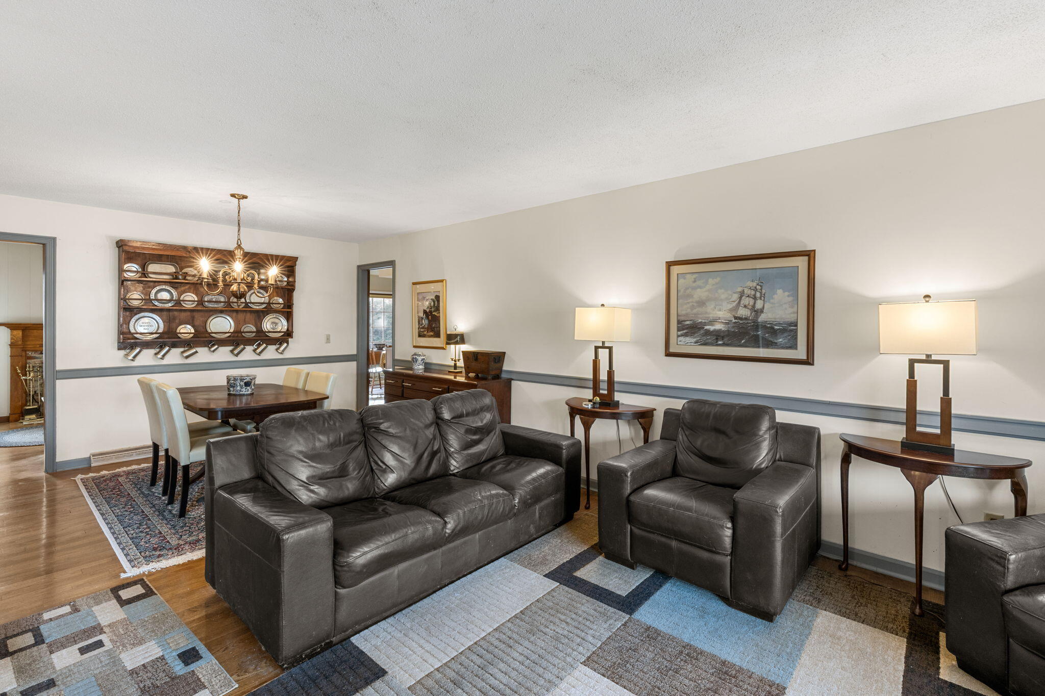 46 Chippingstone Road Chatham, MA 02633 - Photo 6 of 35 a living room with furniture and a wooden floor
