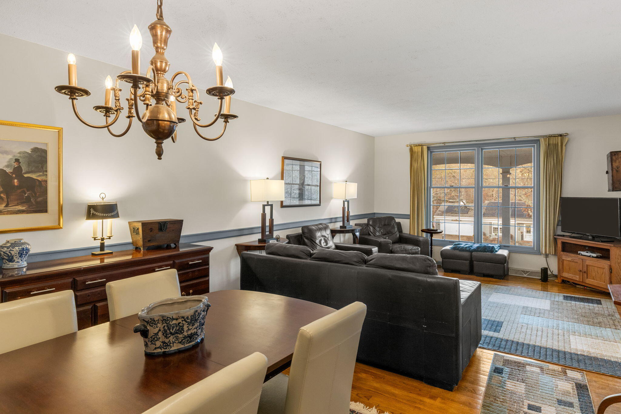 46 Chippingstone Road Chatham, MA 02633 - Photo 8 of 35 a kitchen with a table chairs stove and granite counter top