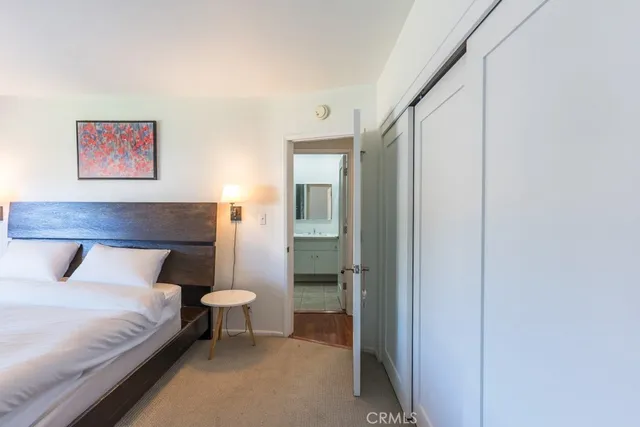 a view of a room with a glass door