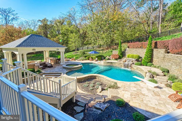 a view of a patio with couches chairs and a table and chairs