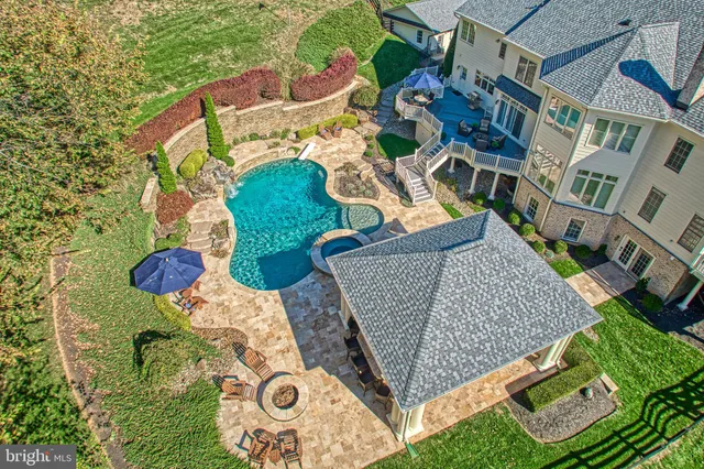 a view of pool with outdoor seating