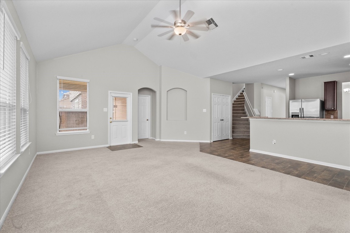 23502 Breckenridge Dale Lane Spring, TX 77373 - Photo 11 of 24 a view of a livingroom with a kitchen and a stove
