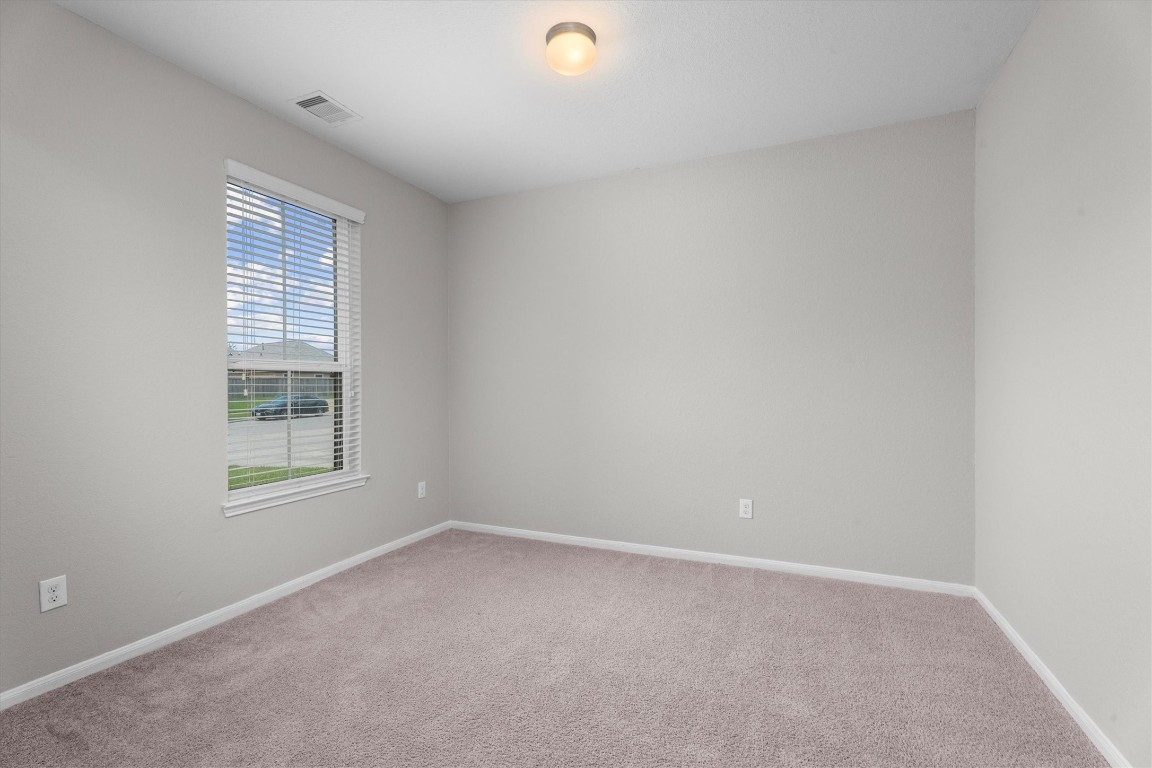 23502 Breckenridge Dale Lane Spring, TX 77373 - Photo 4 of 24 an empty room with a window