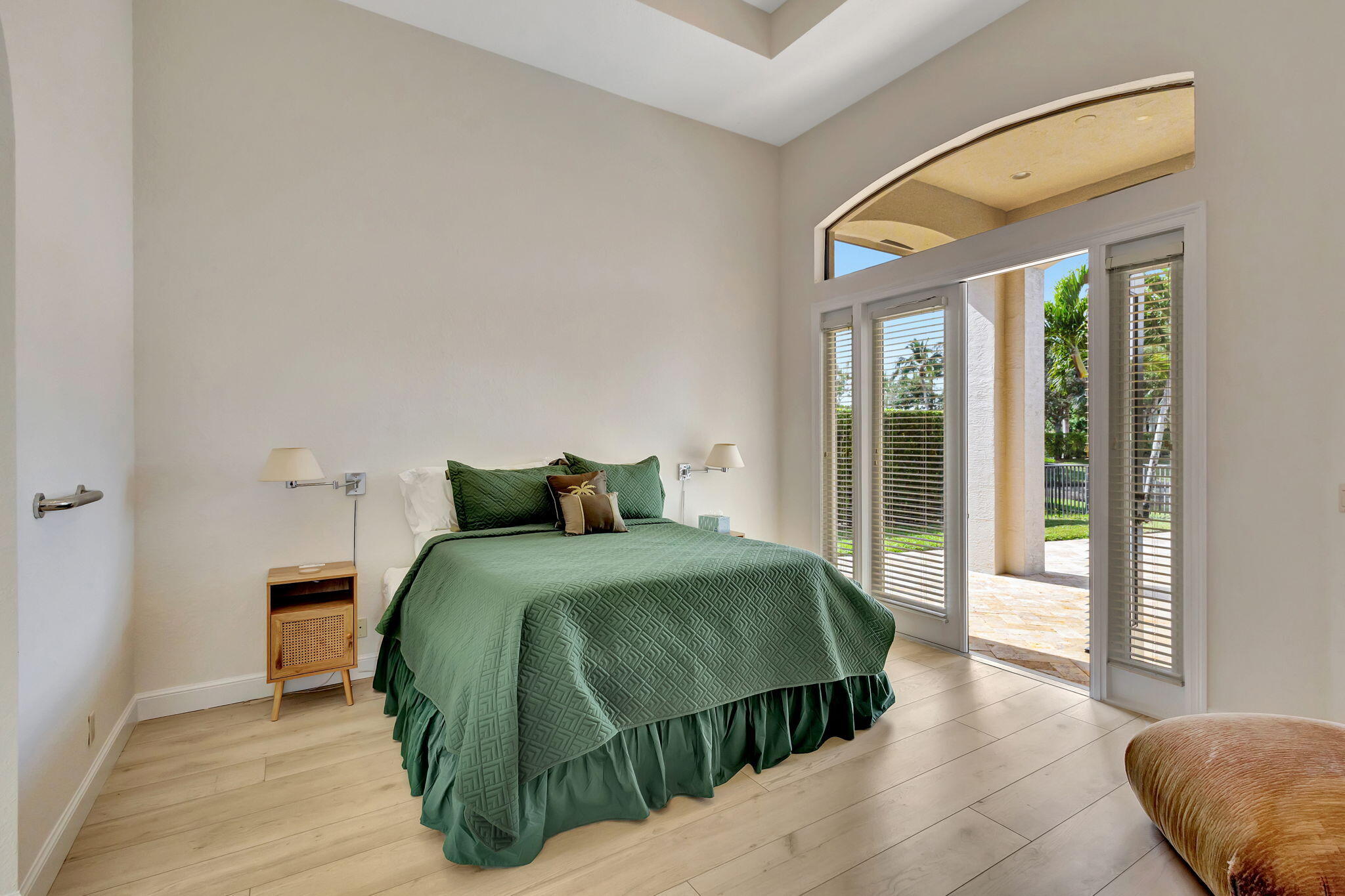 3553 Collonade Drive Wellington, FL 33449 - Photo 24 of 76 a bedroom with a bed and a large window