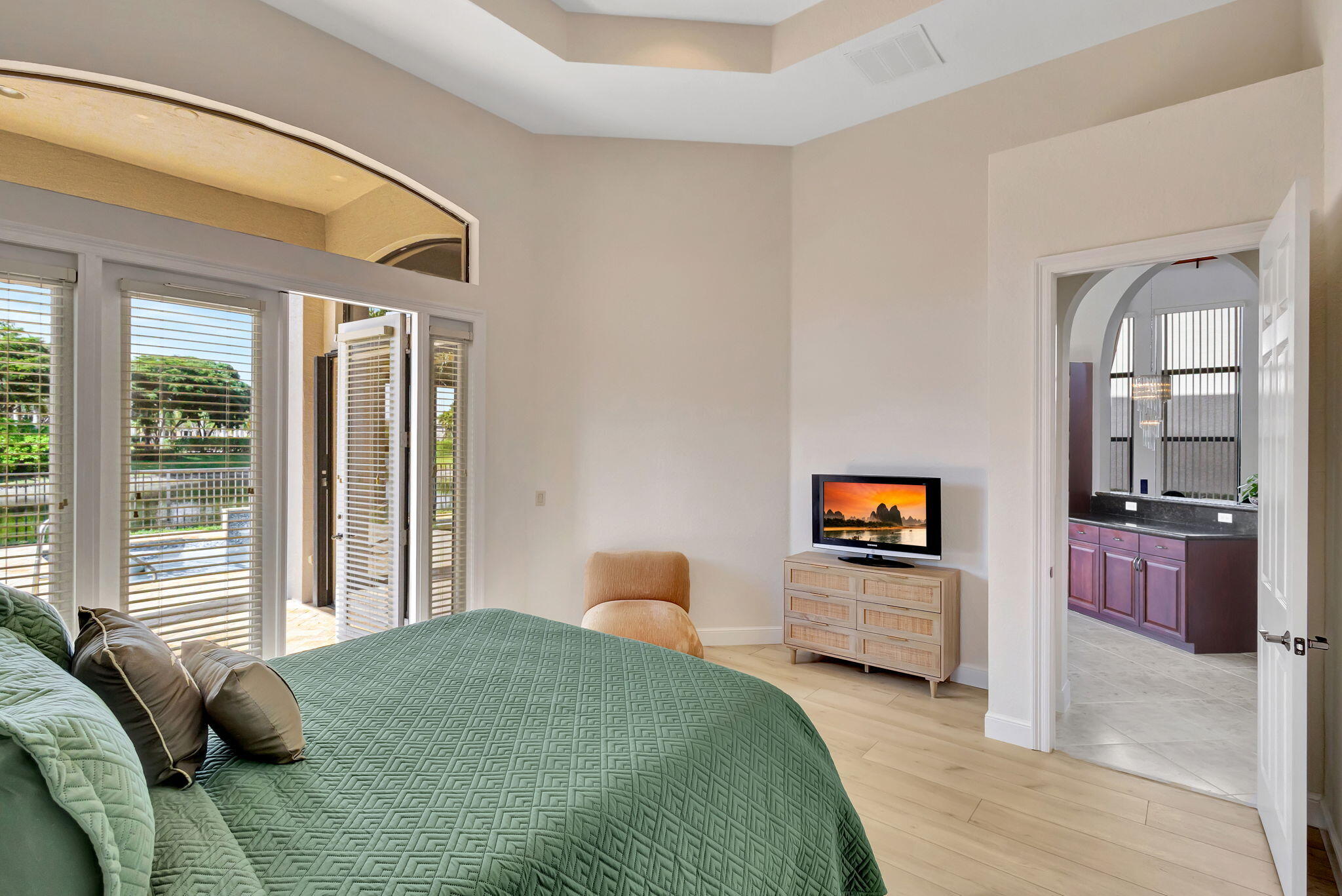 3553 Collonade Drive Wellington, FL 33449 - Photo 26 of 76 a bedroom with a bed and a television