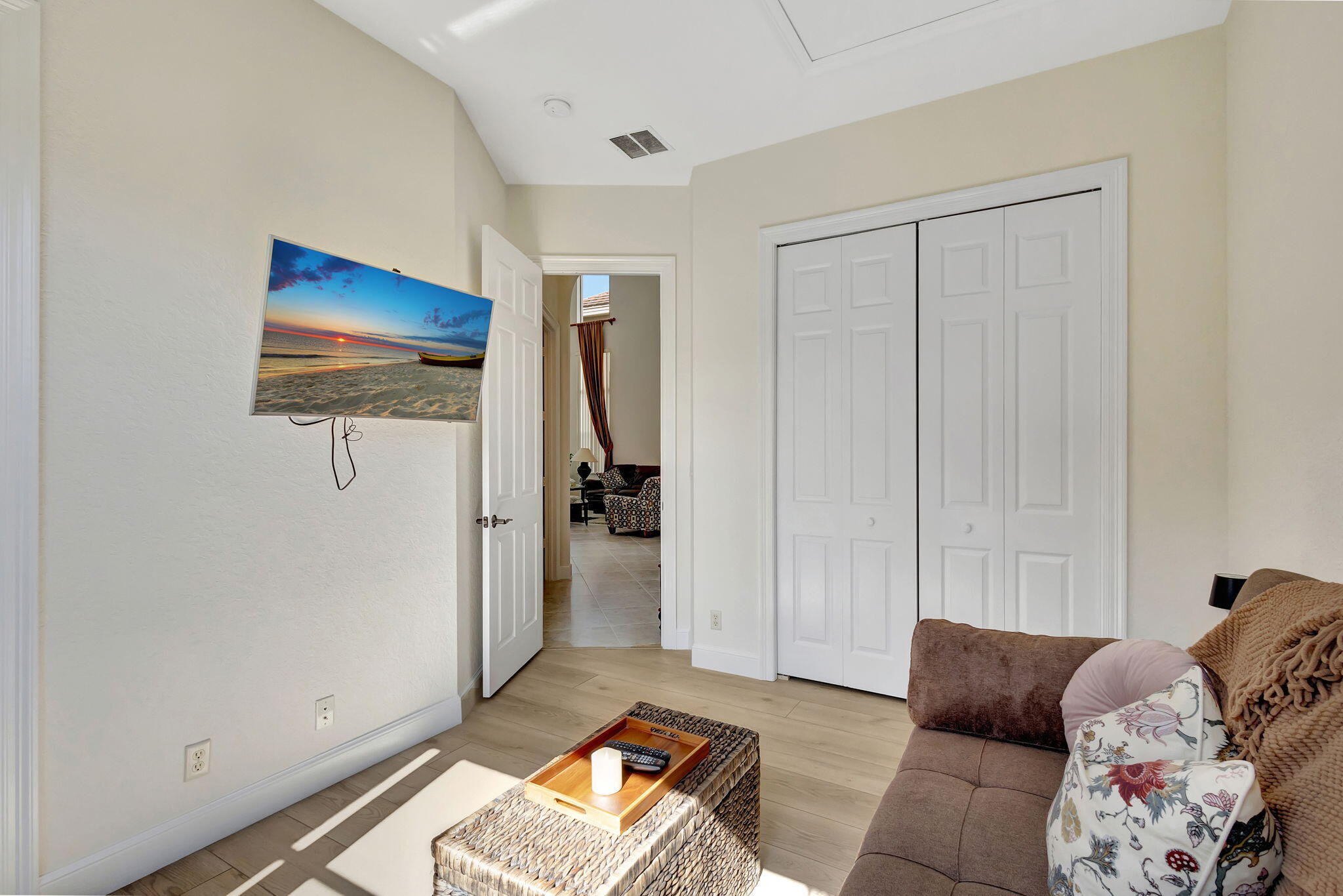 3553 Collonade Drive Wellington, FL 33449 - Photo 37 of 76 a living room with furniture and a gate