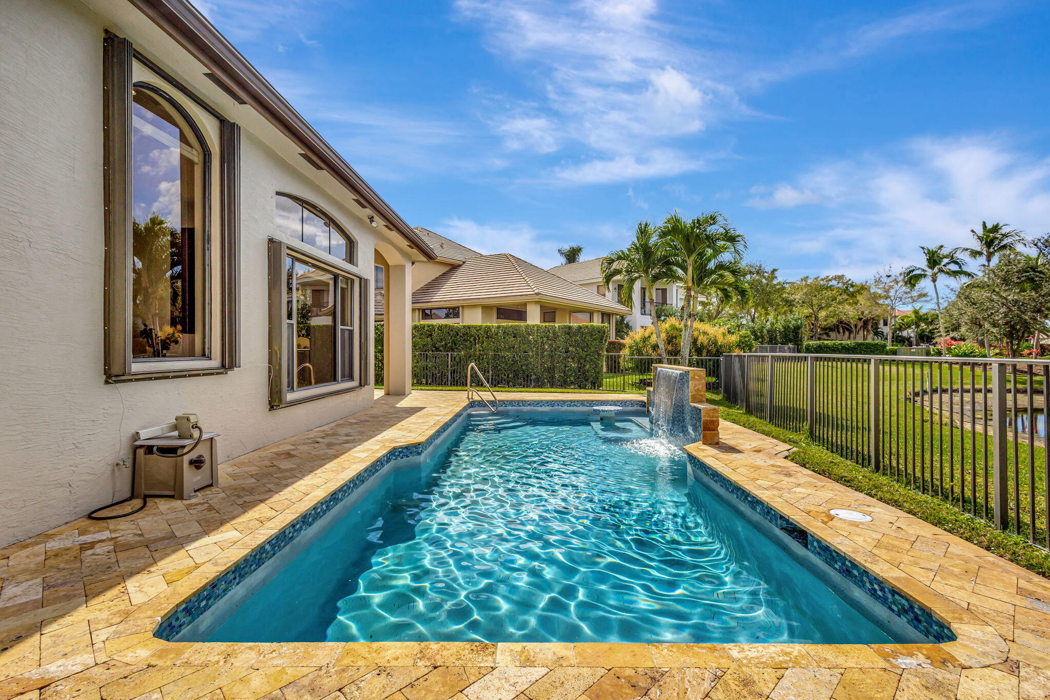 3553 Collonade Drive Wellington, FL 33449 - Photo 45 of 76 a view of swimming pool with a lounge chairs