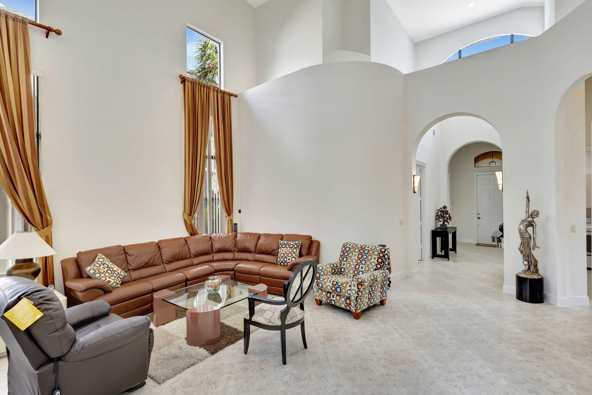 3553 Collonade Drive Wellington, FL 33449 - Photo 10 of 76 a living room with furniture and a window