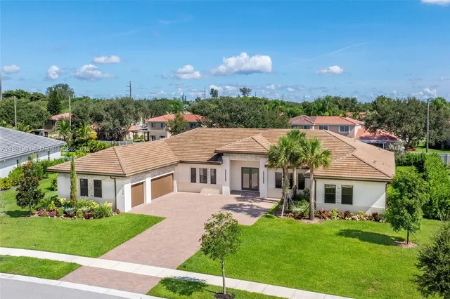 a aerial view of a house with a garden