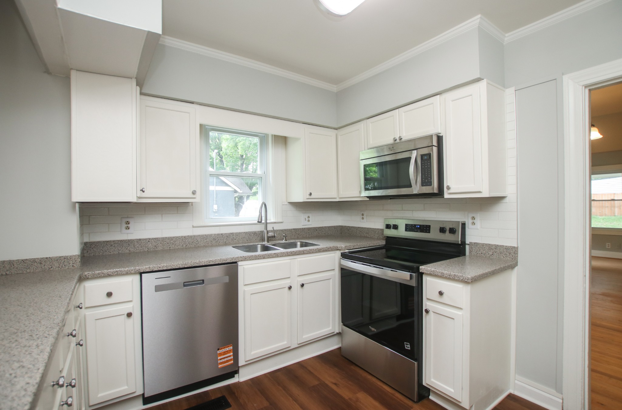 828 East Castle Street Murfreesboro, TN 37130 - Photo 2 of 56 a kitchen with appliances a sink and cabinets