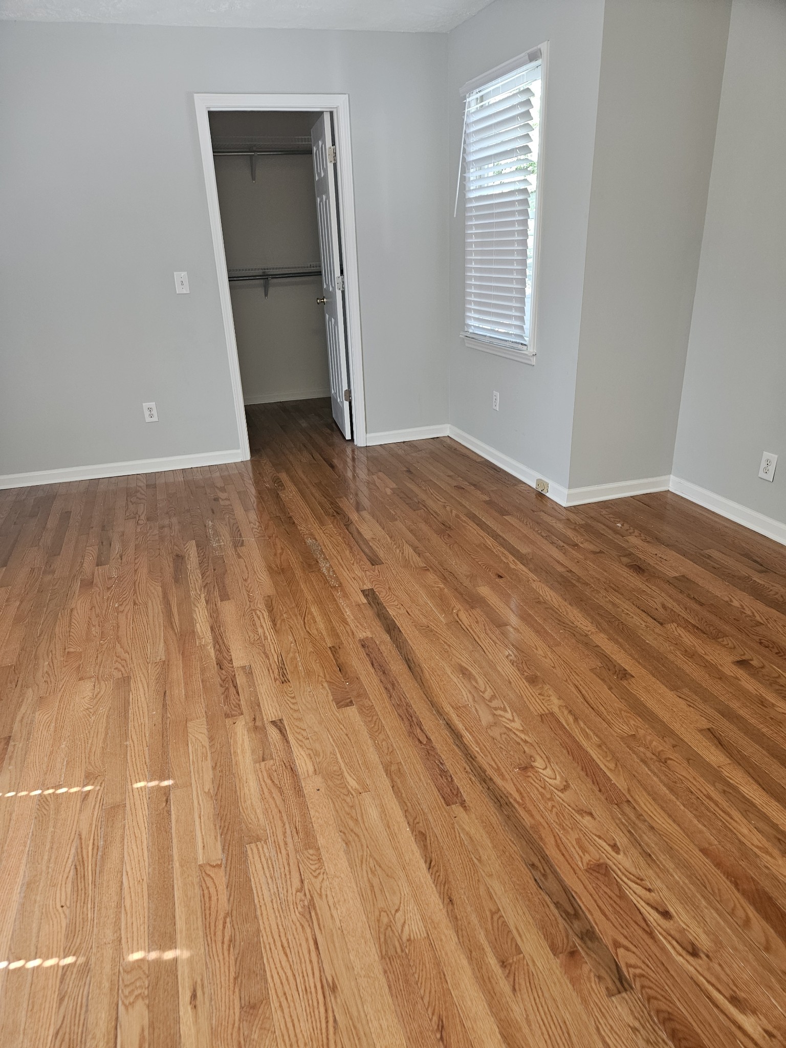 828 East Castle Street Murfreesboro, TN 37130 - Photo 27 of 56 an empty room with wooden floor and a bathroom