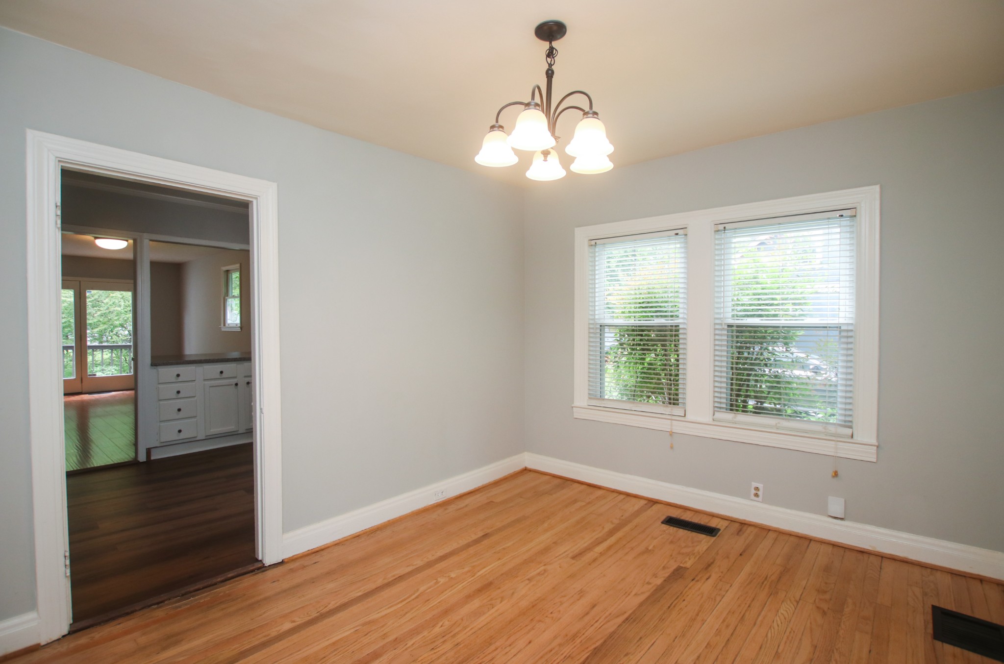 828 East Castle Street Murfreesboro, TN 37130 - Photo 33 of 56 a view of an empty room with wooden floor and a window