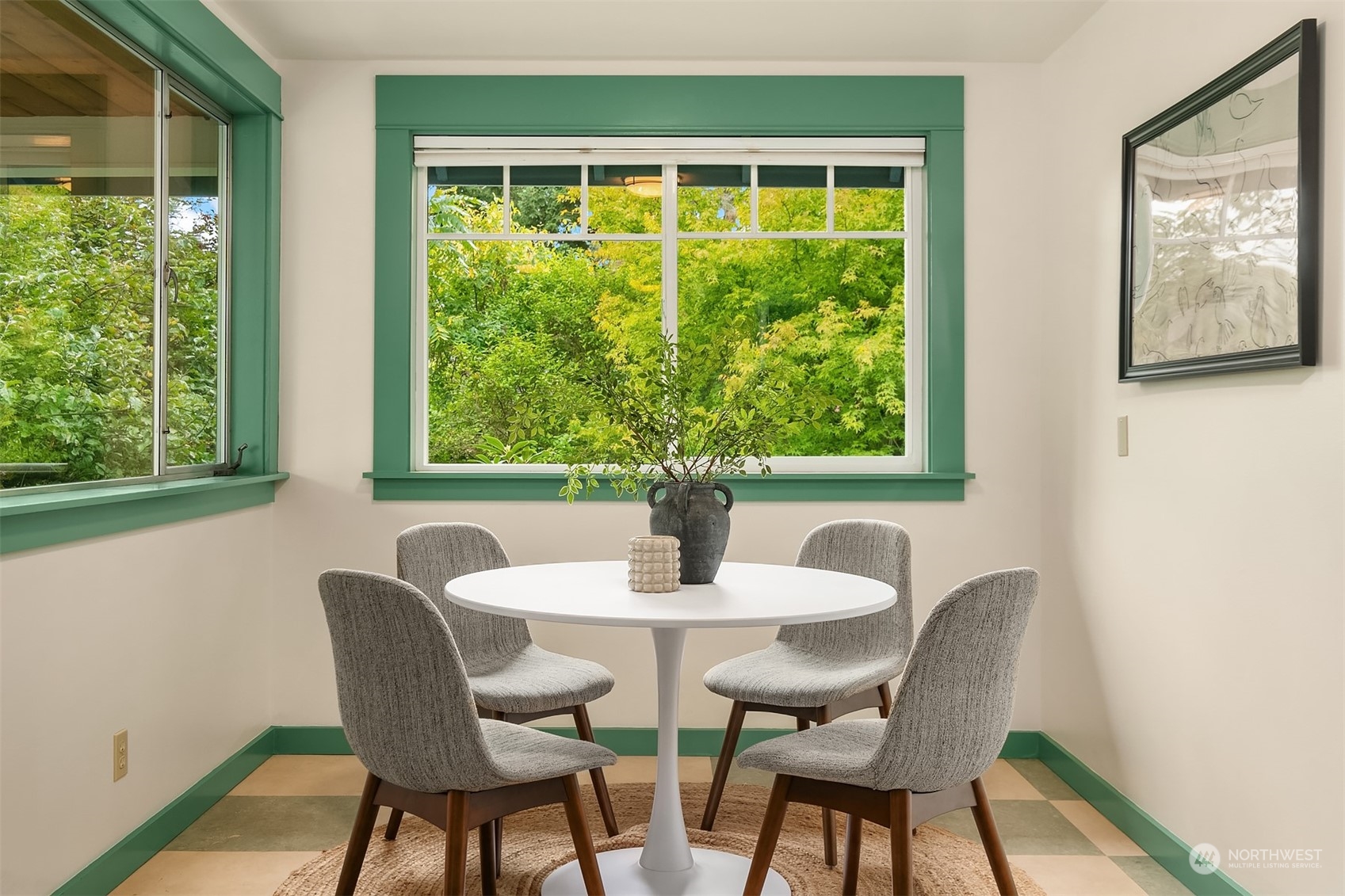 8752 Evanston Avenue North Seattle, WA 98103 - Photo 14 of 29 a view of a dining room with furniture window and outside view