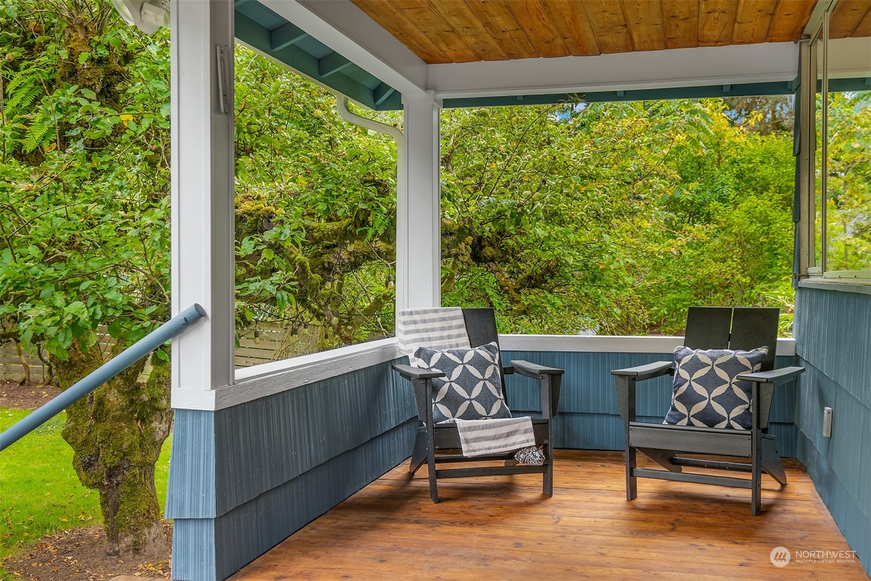 8752 Evanston Avenue North Seattle, WA 98103 - Photo 16 of 29 a view of a two chairs in the balcony