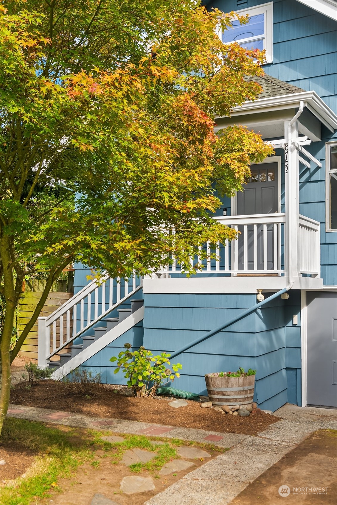 8752 Evanston Avenue North Seattle, WA 98103 - Photo 2 of 29 a view of a swimming pool with an outdoor seating