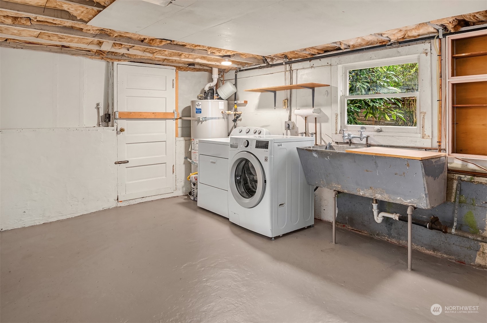 8752 Evanston Avenue North Seattle, WA 98103 - Photo 26 of 29 a utility room with dryer and washer