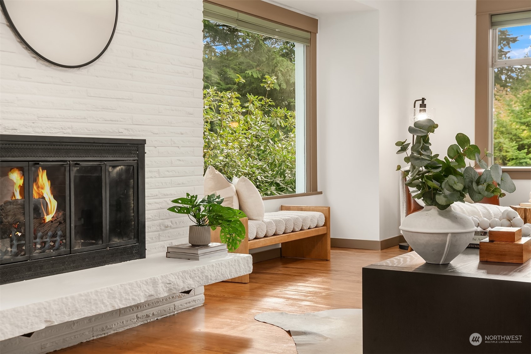 8752 Evanston Avenue North Seattle, WA 98103 - Photo 7 of 29 a living room with furniture a window and a potted plant