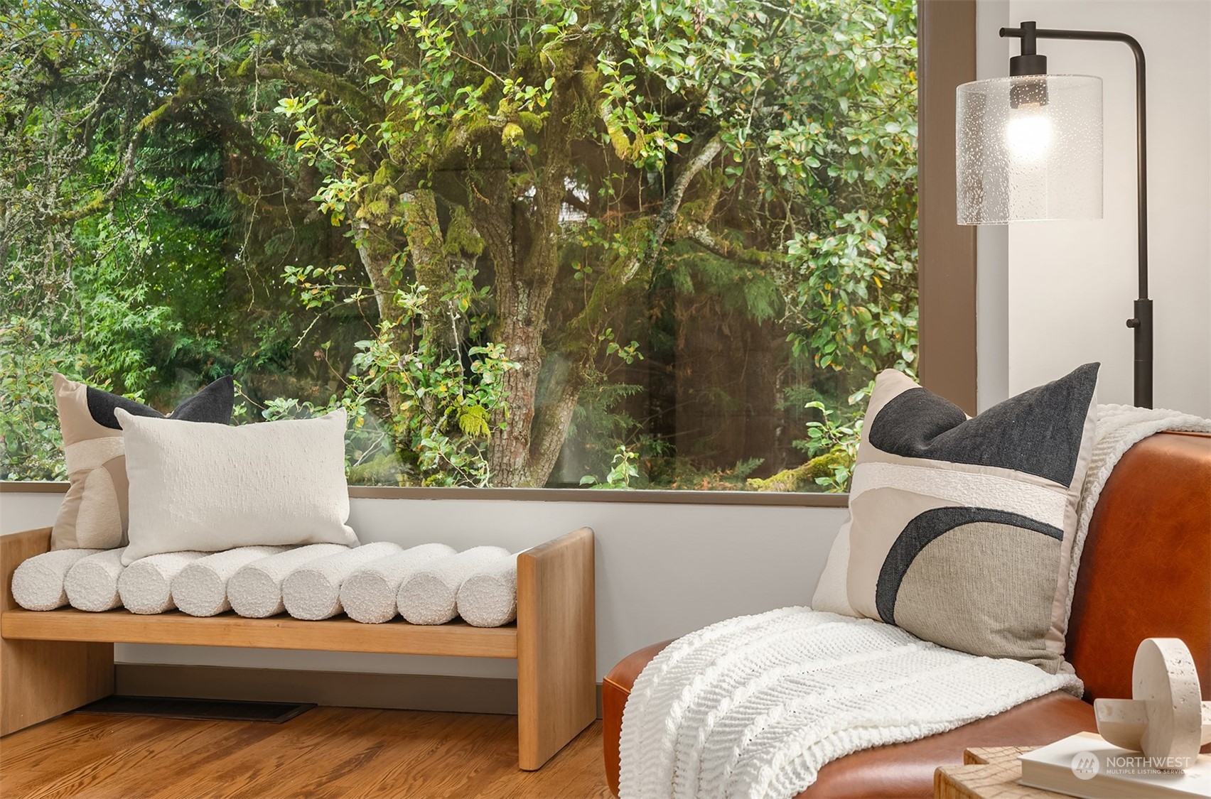 8752 Evanston Avenue North Seattle, WA 98103 - Photo 8 of 29 a outdoor sitting area with furniture and garden