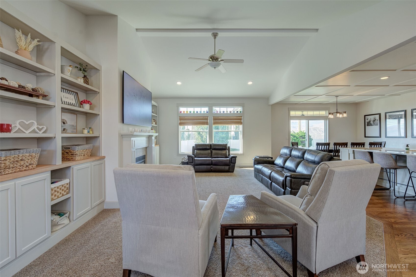 826 Autumn Crest Drive Wenatchee, WA 98801 - Photo 12 of 38 a living room with furniture and a flat screen tv