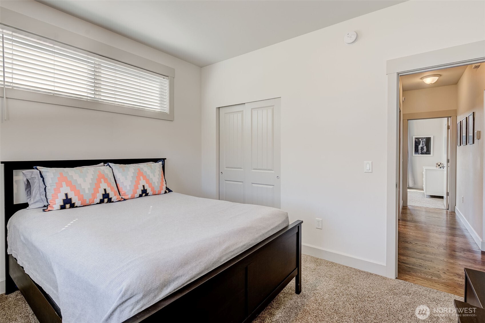826 Autumn Crest Drive Wenatchee, WA 98801 - Photo 22 of 38 a bedroom with a bed and wooden floor